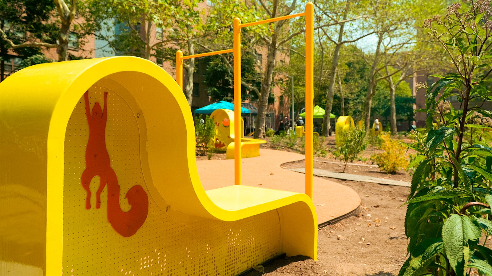 Recycled corks provide surfacing for the playground and pathways at this Brooklyn community.