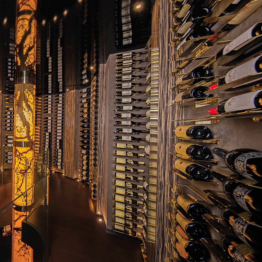Artist and cellar designer Robert Cameron created a 14-foot-tall sculpture filled with different decades of Sauternes as the centerpiece of a client’s home cellar in Toronto.