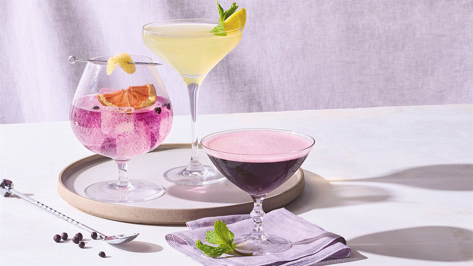  From left: Empress 1908 Gin &amp; Tonic, Peach Fizz, Berry Stinger