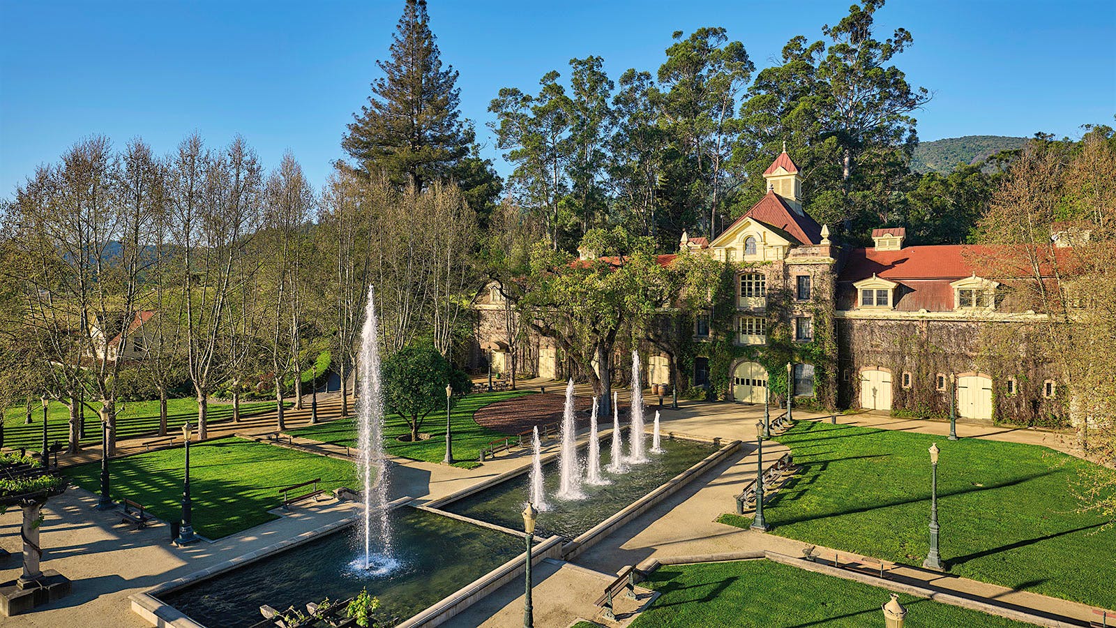 Landscape view of Inglenook winery in Napa Valley, California, with its courtyard fountain