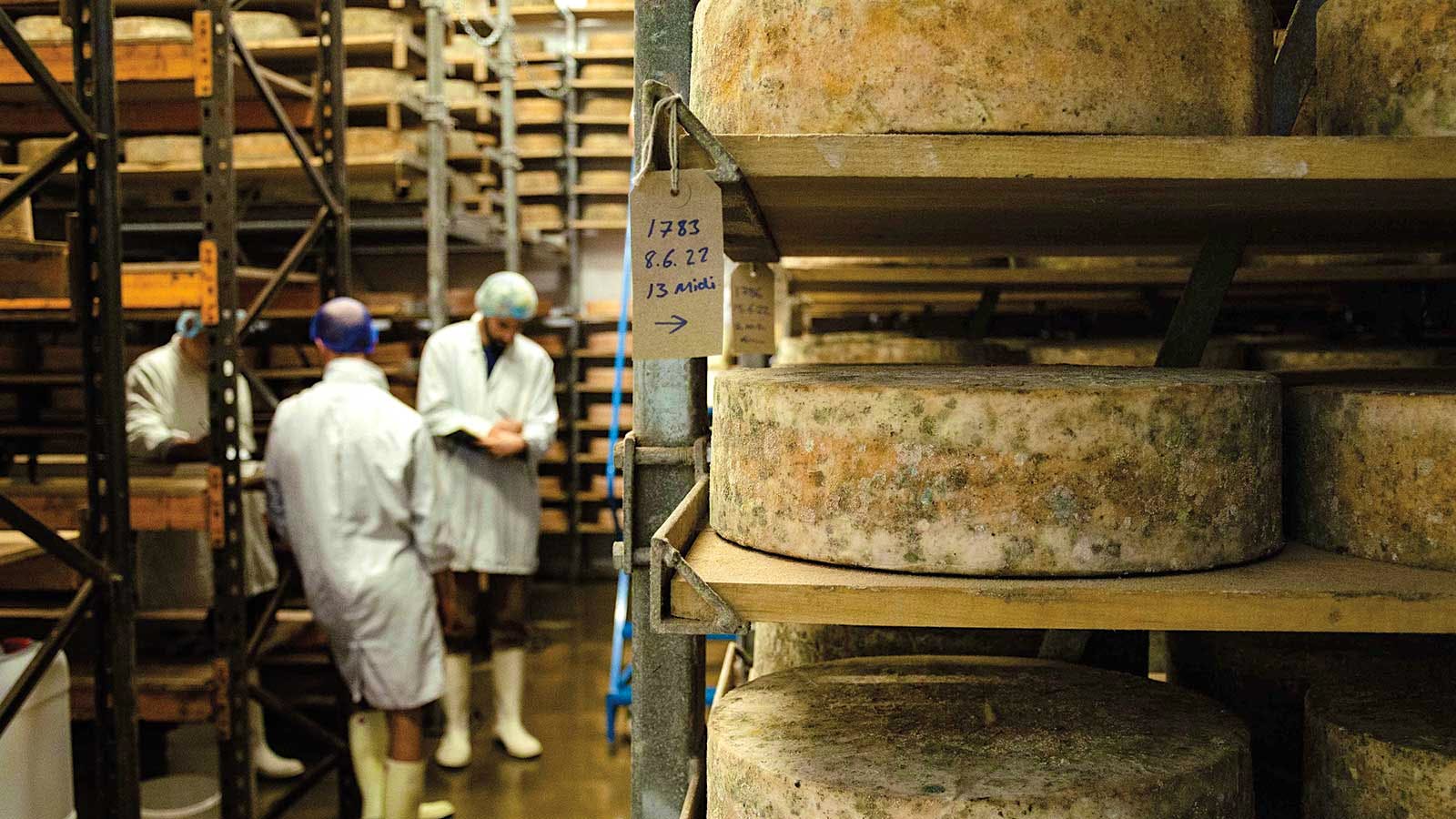 Cheesemongers working in the Neal's Yard Dairy in London.