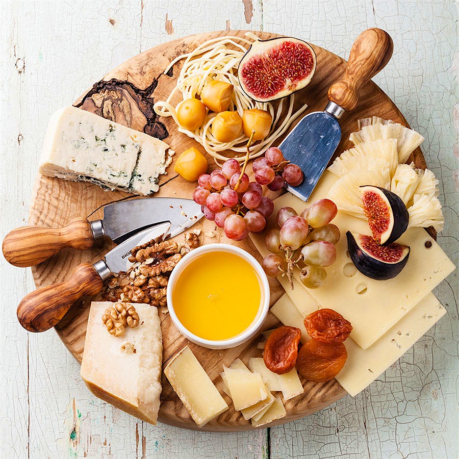 A cheese plate isn’t complete without the sweet and savory balance that fruits, jams, crackers and nuts bring to the table.