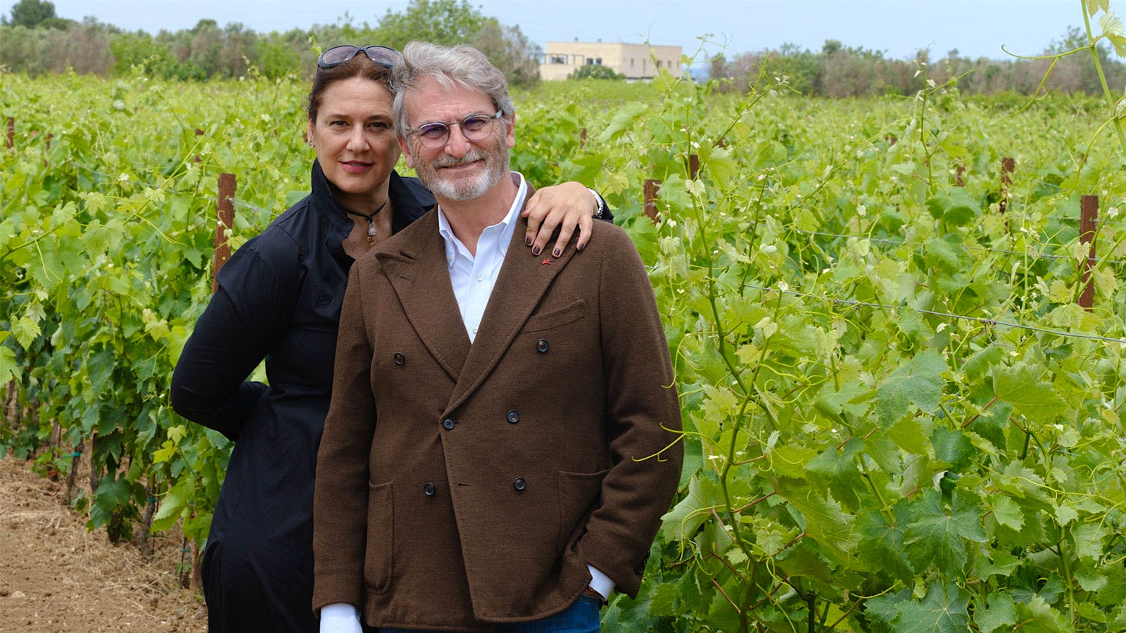 Gianfranco and Simona Fino stand in one of their Puglia vineyards outside the town of Manduria, Italy.