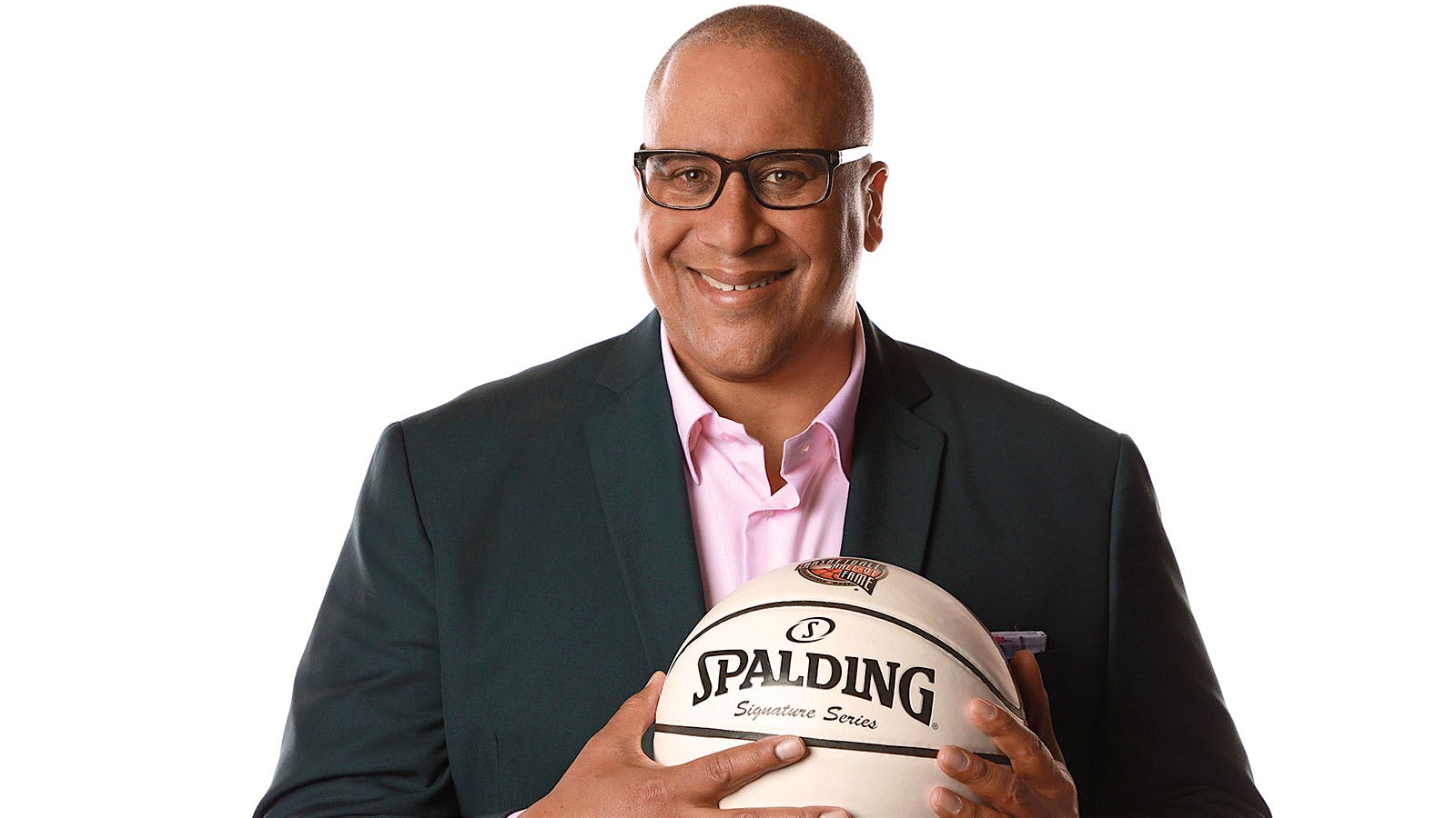 Sports writer Marc J. Spears with a basketball