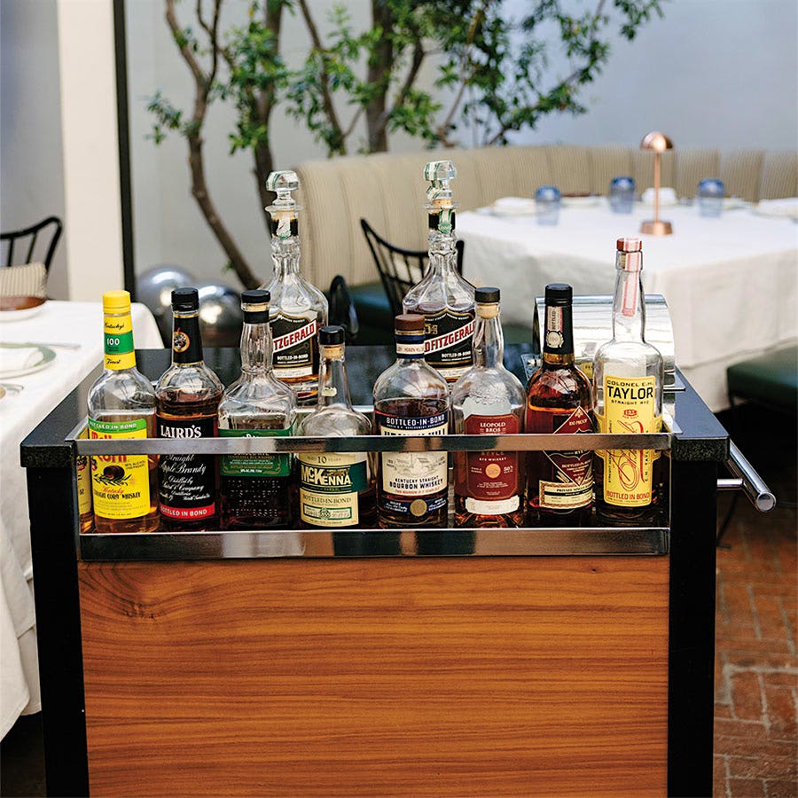 Spago Beverly Hills offers guests a wide selection of spirits from its table-side Bottled in Bond cart.