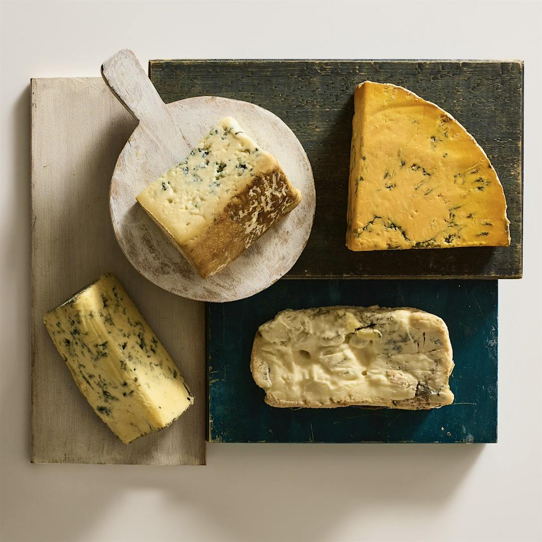 Clockwise from top: Blue di Bufala from Italy, Shropshire Blue from England, Gorgonzola Cremificato from Italy and Cashel Blue from Ireland.