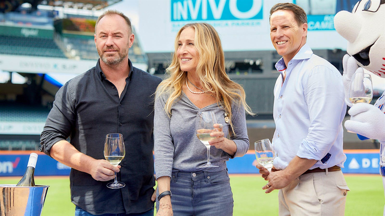 Rob Cameron, Sarah Jessica Parker and Tim Lightbourne at City Feild in Queens, New York, for an Invivo promotional event